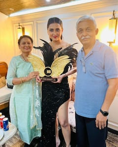 IN PICS| Bigg Boss 15 Winner Tejasswi Prakash Flaunts Her Trophy As She Poses With Her Parents