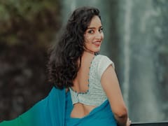 malavika menon pics: கொட்டும் அருவி... சிலு சிலு சாரக்காத்து... அழகை அள்ளும் மாளவிகா மேனன்..!