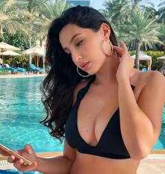 બ્લેક બિકિનીમાં નોરા ફતેહીએ સ્વીમિંગ પૂલમાં લગાવી આગ, દુબઈમાં કરી રહી છે એન્જોય