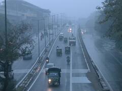 IN PICS | Delhi-NCR Wakes Up To Light Showers, Temperature Dips. AQI Remain 'Very Poor'