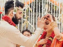 Mouni Suraj Photos: शादी के बाद पति की बाहों में नजर आईं Mouni Roy, देखिए कैसे खिल रहा है नई नवेली दुल्हन का चेहरा