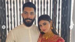 Mouni Roy: সিঁথিতে সিঁদুর, লাল বেনারসি, মৌনীর নববধূ সাজে মুগ্ধ সূর্য