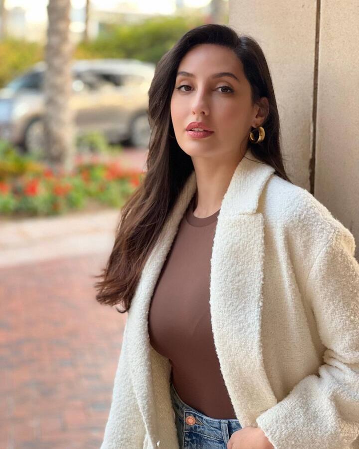 अभिनेत्री आणि डांसर नोरा फतेही (Nora Fatehi) नेहमीच तिच्या लुक्स मुळे चर्चेत असते. (Photo Credit: Nora Fatehi Instagram)