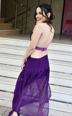 પર્પલ બેકલેસ ડ્રેસમાં Urfi Javedના કિલર પોઝ, ગ્લેમરસ ફોટો પરથી નજર નહી હટે