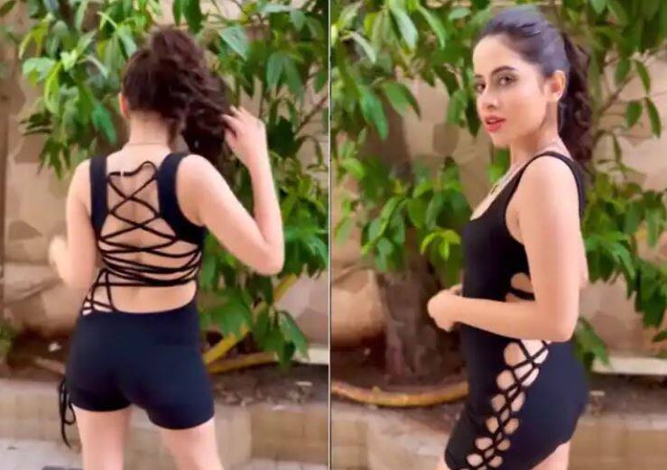 urfi javed shares video in black criss cross dress  બ્લેક ક્રિસ-ક્રોસ ડ્રેસમાં Urfi Javed નો કિલર લૂક, વીડિયો શેર કરી પૂછ્યો ચાહકોને આ સવાલ