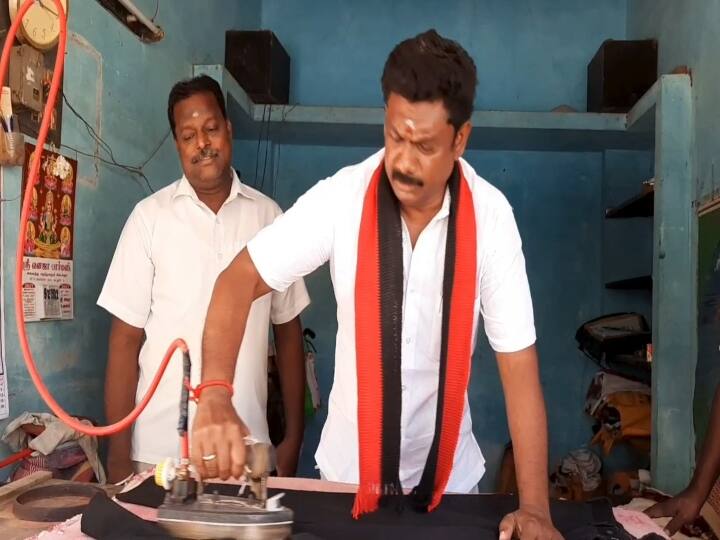 Local body election DMK candidate collects votes for Udayasooriyan by ironing clothes in Cuddalore Local body election | ஆடைகளுக்கு இஸ்திரி போட்டு உதயசூரியனுக்கு ஓட்டு கேட்ட திமுக வேட்பாளர்