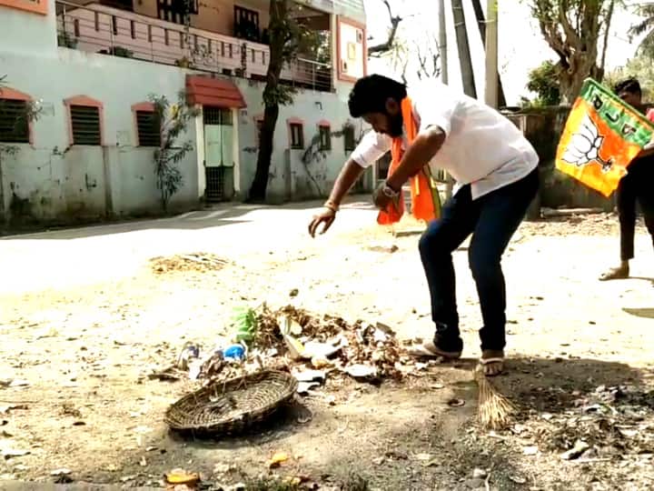 Mayiladuthurai Urban Local Body Election 2022 Tamilnadu Mayiladuthurai District BJP candidate collects votes by littering! Local Body Election | குப்பைகளை அள்ளி வாக்குகளை ஸ்கோர் செய்த பாஜக வேட்பாளர்