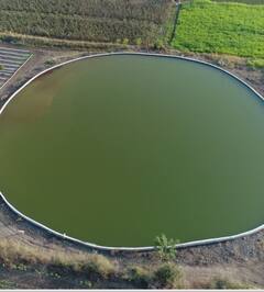 PHOTO : हा तलाव नाही तर विहीर! बीडच्या शेतकऱ्याची कमाल; दीड कोटी रुपये खर्चून बांधली महाकाय विहीर