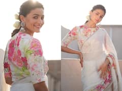 Alia Bhatt Photos: फूलों से भरी साड़ी में खड़ीं Alia Bhatt की हसीन अदाएं देख आप भी कहेंगे - 'उफ्फ! आस्मां से उतर आई है परी..