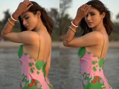 बालों के संभालते हुए Mouni Roy ने शेयर कीं अपनी सिज़लिंग फोटोज़, पिंक-ग्रीन ड्रेस में लगीं डॉल