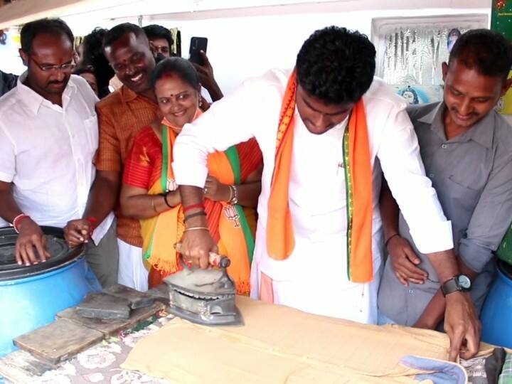 Bjp state president Annamalai collects votes by ionizing cloth in local body election 2022 துணியை அயன் செய்து கொடுத்து வாக்கு சேகரித்த பாஜக மாநிலத் தலைவர் அண்ணாமலை!