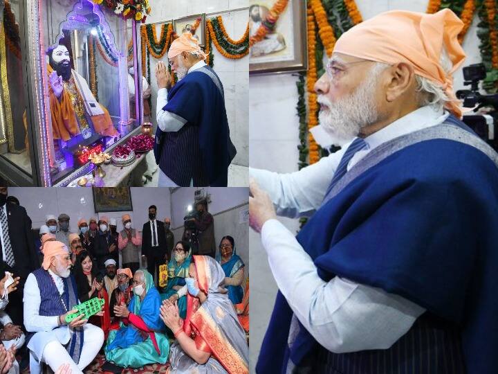 Narendra Modi At Ravidas Vishram Dham Temple: आज रविदास जयंती है. इस मौके पर देश के प्रधानमंत्री नरेंद्र मोदी दिल्ली के करोल बाग स्थित रविदास विश्राम धाम मंदिर में पहुंचे.जहां उन्होंने रविदास की प्रतिमा के सामने माथा टेका और शबद कीर्तन में हिस्सा लिया. आप भी डालिए इन तस्वीरों पर एक नजर....