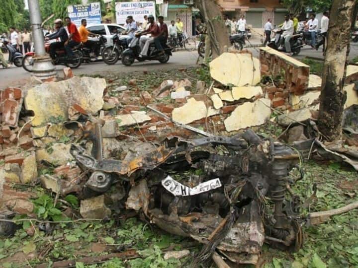 The blasts hit Ahmedabad on July 26, 2008, within a span of 70 minutes. This is an image of a destroyed vehicle after the serial bomb blasts in Ahmedabad, Gujarat in 2008 | Photo: Getty Images
