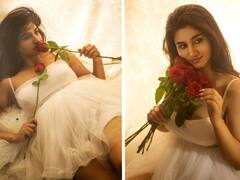 Varshini Pics: మినీ స్కర్ట్‌లో దేవకన్యలా వర్షిణీ - చేతిలో ఎర్ర గులాబీలు, ఆ ఎదురు చూపుల్లో ఎన్నో భావాలు!