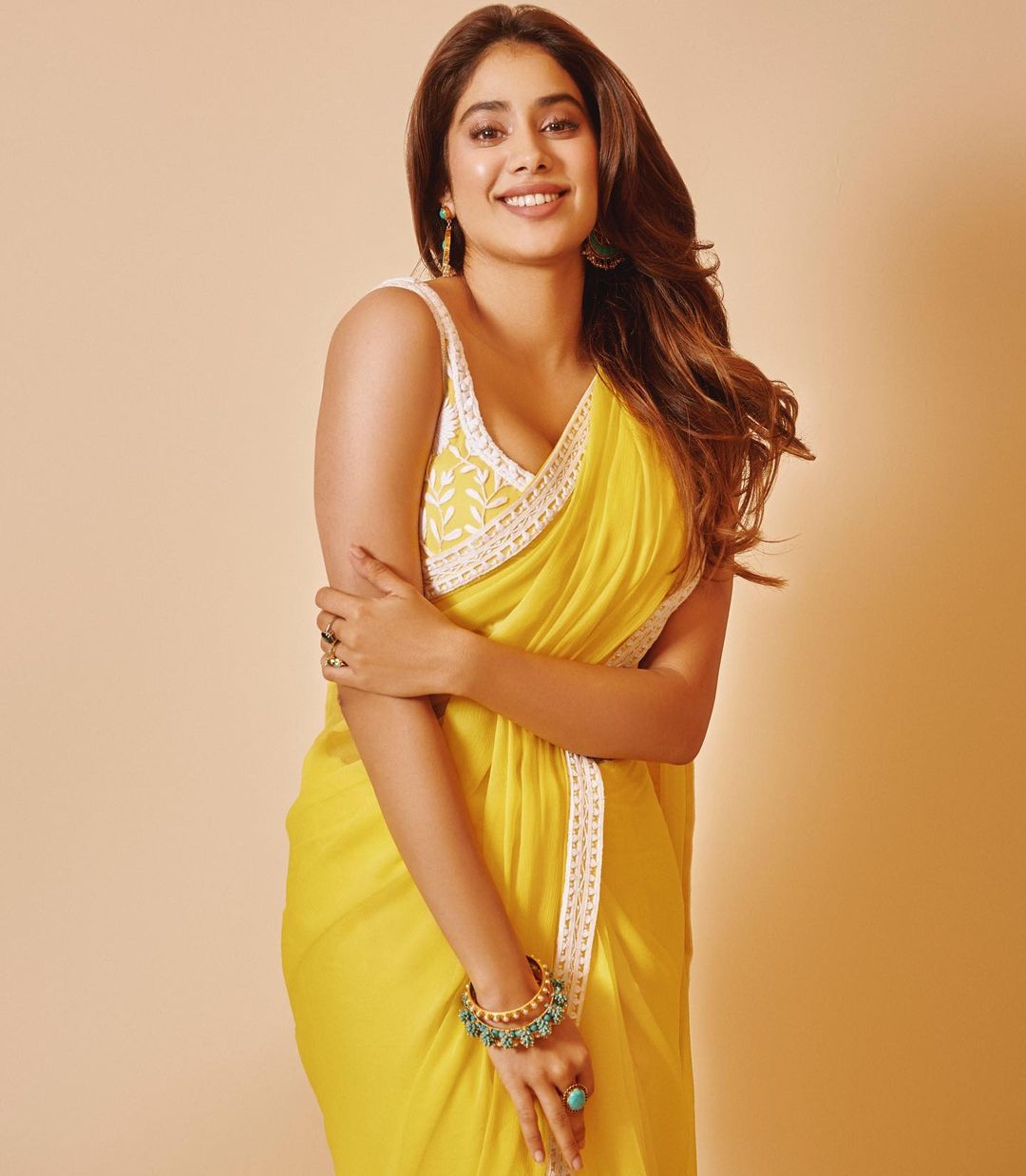 Premium AI Image | Happy stylish pretty Indian girl in a saree with jewelry