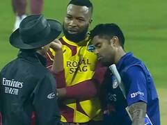 IND vs WI: প্রতিপক্ষের কাঁধে মাথা, ইডেনে ভাইরাল সূর্যকুমার-পোলার্ডের ছবি