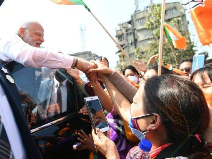 Modi greeted BJP supporters in Manipur. At the rally, he said that under the PM Awas Yojana, more than 60,00 houses are being built in Manipur. Most of these are owned by women, he said. (Photo: Twitter/@ANI)