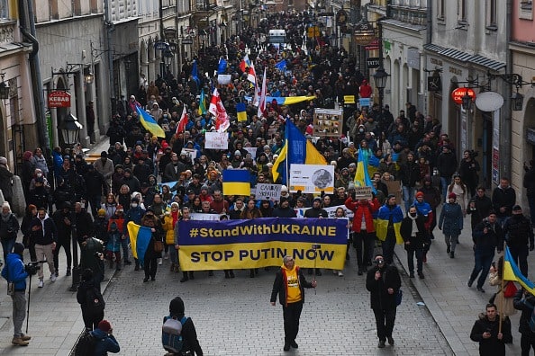 Ukrainians and Polish citizens stage a protest held to show solidarity with Ukraine amid heightened tensions between Kyiv and Moscow in Krakow, Poland on February 20, 2022. (Getty Images)