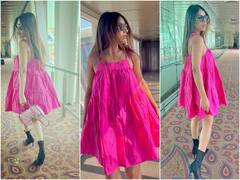 TV Diva Nia Sharma Aces Airport Look In Short Pink Dress & Black Boots- See Pics