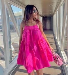 TV Diva Nia Sharma Aces Airport Look In Short Pink Dress & Black Boots- See Pics