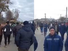 WATCH | Hundreds Of Ukrainian Civilians Block Russian Tanks From Advancing