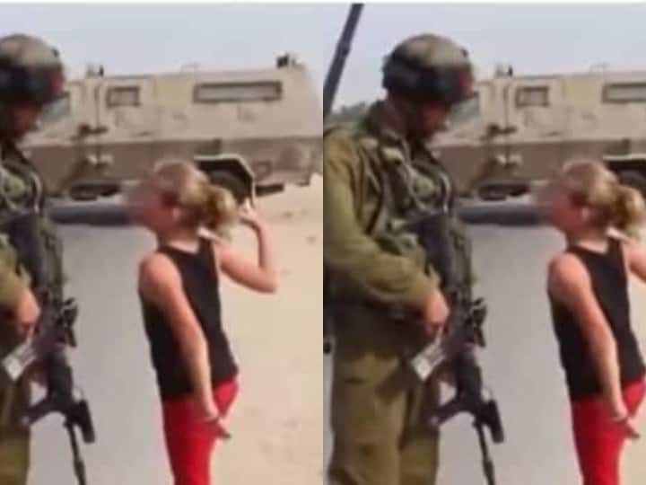 This girl is going viral amid Ukraine Russia crisis, people are doing salute to her spirit, know what is the truth of the video यूक्रेन रूस संकट के बीच वायरल हो रही है ये बच्ची, लोग कर रहे जज्बे को सलाम, जानिये क्या है वीडियो को सच
