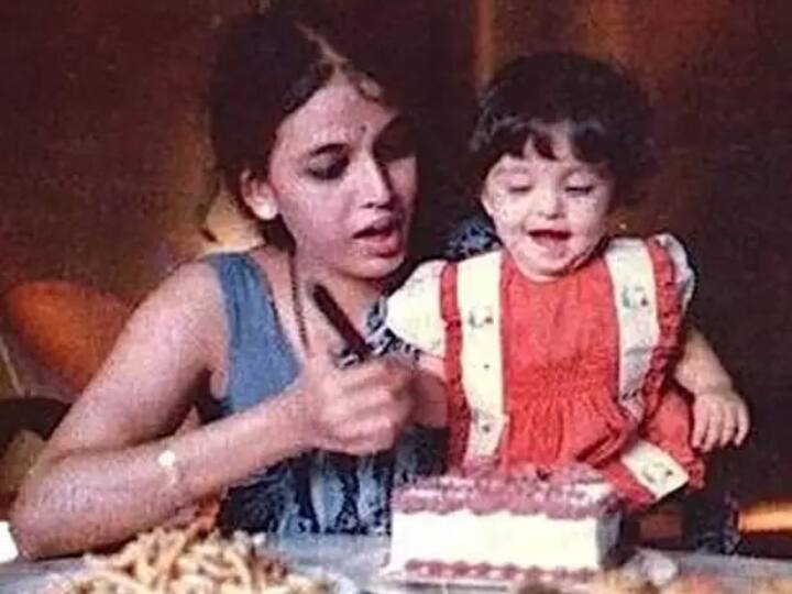 Aishwarya rai bachchan childhoodphoto going viral on internet मां का हाथ पकड़कर केक काटती इस बच्ची को पहचाना क्या? नीली आंखों से दीवाना बनाती हैं ये हसीना
