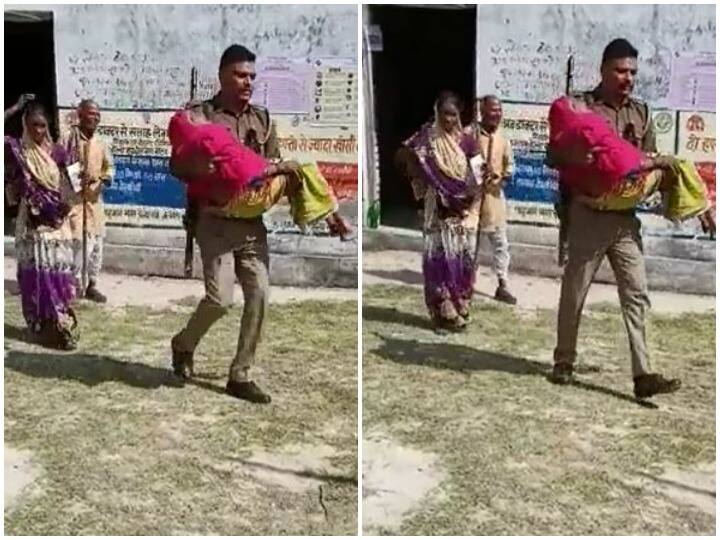 UP police constable helps elderly woman at polling station In UP Election 2022 मतदान केंद्र पर बुजुर्ग महिला की मदद करता दिखा यूपी पुलिस का सिपाही, वायरल हुआ वीडियो