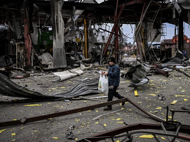 Though many have already been killed, Ukraine heads towards a crisis that needs immediate world attention. A child evacuates the city of Irpin, northwest of Kyiv, during heavy shelling and bombing on March 5, 2022, ten days after Russia launched a military invasion on Ukraine. (AFP)