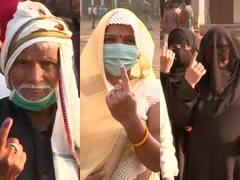 यूपी चुनाव के अंतिम चरण के दौरान वोटरों में जबरदस्त उत्साह, बूथ के बाहर लगी लंबी कतारें, देखें PICS