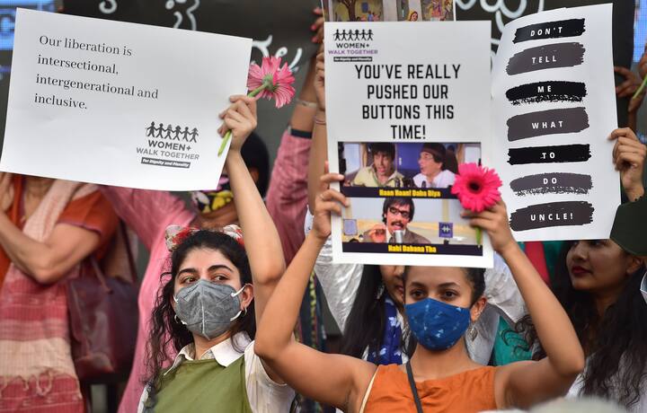 Members of Concerned Women of Bangalore and their supporters hold placards during a demonstration for dignity, education, choice, plurality and peace, ahead of International Womens Day, in Bengaluru, Sunday, Mar 6, 2022. (Photo: PTI)