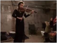 यूक्रेन में बम धमाकों के बीच शेल्टर में वायलिन बजाती दिखी एक महिला, वायरल हो रहा वीडियो