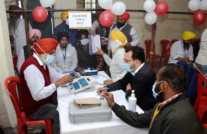 Election staff during counting day of Punjab Assembly elections, at a counting centre in Amritsar district. (Photo: PTI)