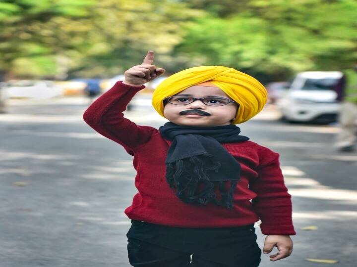 A child dressed as Aam Aadmi Party (AAP)s Punjab CM candidate Bhagwant Mann reacts, during counting day of Punjab Assembly polls, at party office in New Delhi, Thursday, March 10, 2022. (PTI Photo/Manvender Vashist)