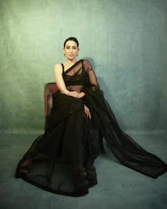 Karisma Kapoor Dazzles In A Sheer Black Saree For Award Night- SEE PICS