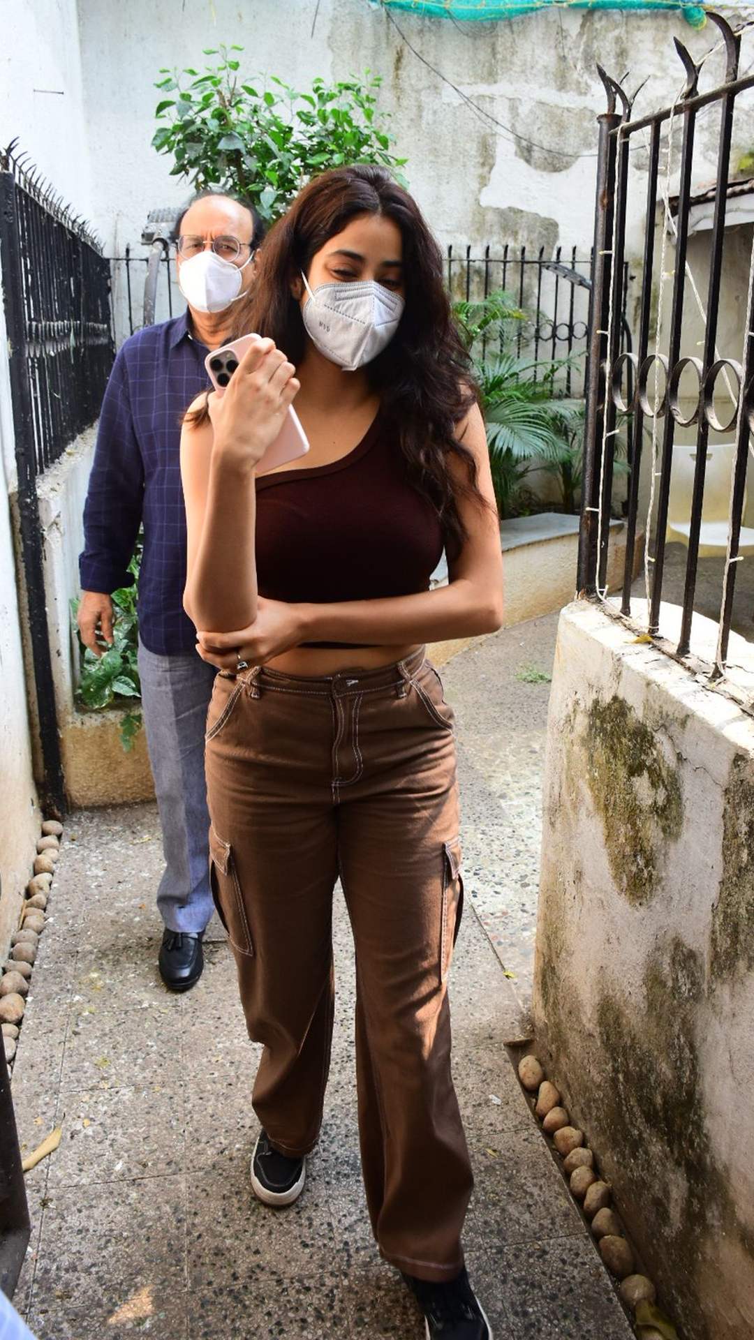 Janhvi Kapoor proves her love for flared bottoms once again in brown  trousers with micro checks