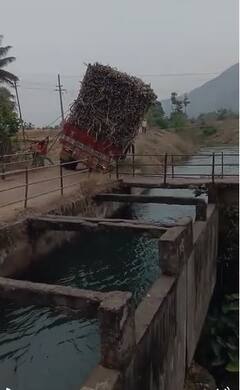 PHOTO : गेला...गेला...पडला...पडला म्हणेस्तोवर गच्च भरलेला उसाचा ट्रक कालव्यात कोसळला!