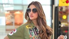 Nusrat Jahan: প্রিন্টেড জাম্পশ্যুট, খোলা চুল, বিমানবন্দরে নজরকাড়া নুসরত