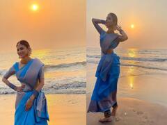 नीली साड़ी, बालो में गजरा और पैरों में घुंघरू...समंदर किनारे मौनी रॉय का दिखा अलग अंदाज