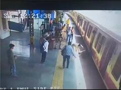 Mumbai News: चलती ट्रेन में चढ़ने की कोशिश कर रहा यात्री प्लेटफॉर्म पर गिरा, RPF जवान ने बचाई जान