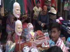 Holi 2022: होली के बाजारों पर चढ़ा सियासी रंग, प्रयागराज में मोदी और योगी के मुखौटों की जबरदस्त डिमांड