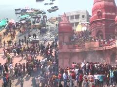 Holi 2022: होली के रंग में रंगा वाराणसी का मणिकर्णिका घाट, हजारों की संख्या में शामिल हुए लोग, सामने आईं तस्वीरें