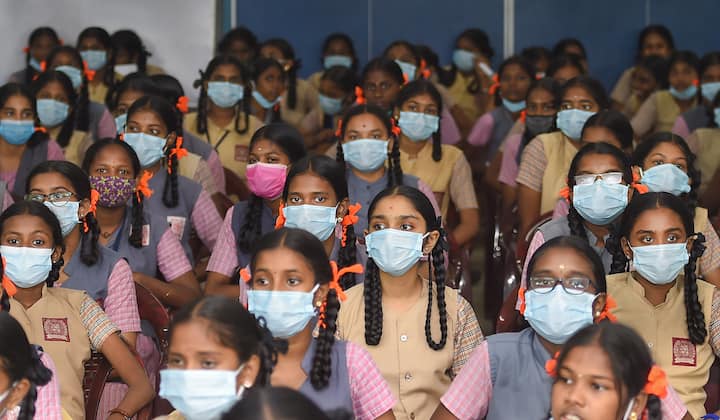 Students wait to receive a dose of Covid-19 vaccine, at a school premises in Chennai. The countrywide vaccination drive was rolled out on January 16, 2021, with the healthcare workers getting inoculated in the first phase. (Image: PTI)