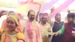 Visuals of Mukhtar Abbas Naqvi's celebrating Holi with colours
