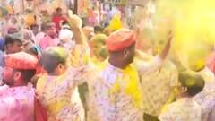 Holi 2022: देश होली के रंग में सराबोर है ऐसे में Mathura के ये मनमोहक दृश्य देख आप खिल उठेंगे