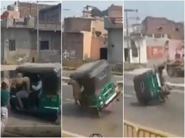 Uttar Pradesh Autorickshaw crashes as Holi reveller hits driver with water balloon- Watch Video UP Auto Accident: బెలూన్ తగిలి ఆటో బోల్తా- ఇదేం హోలీరా నాయనా!