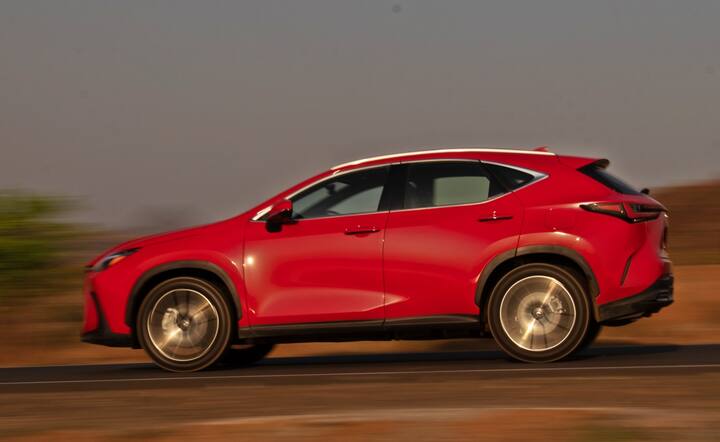 The previous NX luxury SUV was a sharply styled aggressive-looking car and the same is applied to the new one but with more premium execution. The new NX is also bigger and looks much larger while the massive massive grille is beautifully styled too. Unlike the earlier NX, the DRLs are inside the headlamps which are LED projector units with a new lighting pattern. The side view gets strong lines and a lowered roofline which makes it more of a coupe SUV in design terms. You also get big 20 inch wheels that suit the rest of the design. The rear gets a bigger change with new LED tail-lamps connecting to a light bar and new Lexus lettering at the rear. With colours such as the red shown here, this is an SUV which gets a lot of looks and it's not a surprise as to why. (Photography: Clinton Pereira)