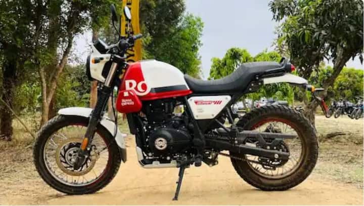Royal Enfield Scram 411 2022: সম্প্রতি ভারতে লঞ্চ করা হয়েছে এই বাইক। এর দাম 2.03 লক্ষ টাকা থেকে শুরু   হয়েছে, এক্স-শোরুম৷ রয়্যাল এনফিল্ড স্ক্র্যাম 411 হিমালয়ের আরও একটি রোড বেস সংস্করণ। এটি হিমালয়ান থেকে একই 411cc   সিঙ্গল-সিলিন্ডার, SOHC, এয়ার-কুলড, ফুয়েল-ইনজেক্টেড ইঞ্জিন পেয়েছে। যা একটি 5-স্পিড গিয়ারবক্সের সঙ্গে পাওয়া যায়।