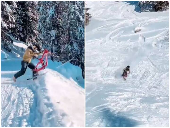 Man made snow boarding exciting by juggling with bicycle  साइकिल के साथ जुगाड़ लगाकर शख्स ने बनाया स्नो बोर्डिंग को रोमांचक, वायरल हो रहा वीडियो