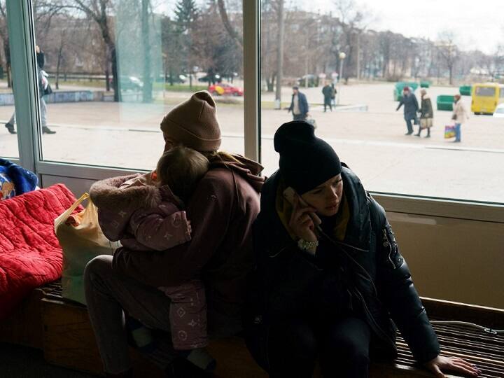 Evacuees from Mariupol wait at the Zaporizhzhya State Circus for transportation to other locations in the city of Zaporizhzhia on March 16, 2022. Some 20,000 residents have been allowed to leave Mariupol through a humanitarian corridor agreed with Russian forces. But exhausted, shivering evacuees speak of harrowing escape journeys. Those out of the country now, await an uncertain future filled with horrors.(Photo: AFP)